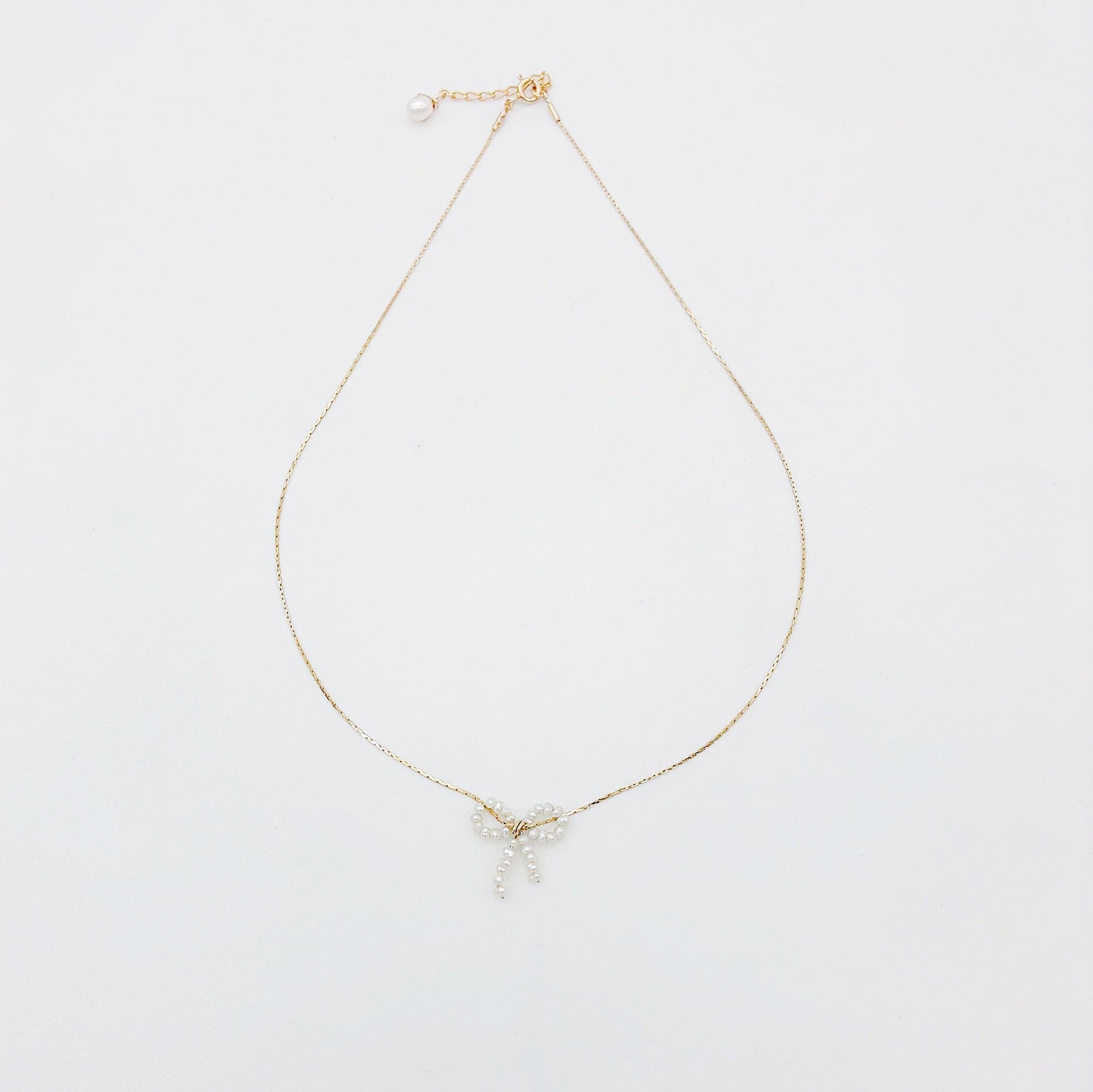 Collier Anita — Collier nœud de perles d'eau douce — bijou mariage artisanal — Les Majestés